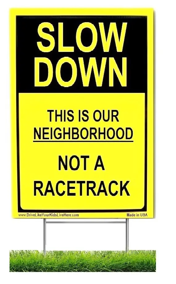 Racetrack -yellow yard sign